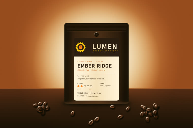 Coffee bag with Ember Ridge label on a wooden table with beans